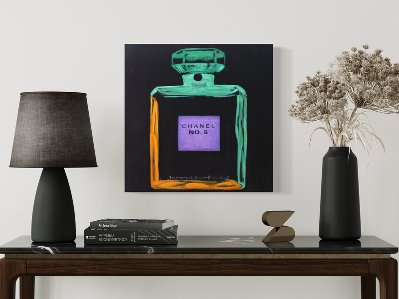 A painting with a coco chanel bottle