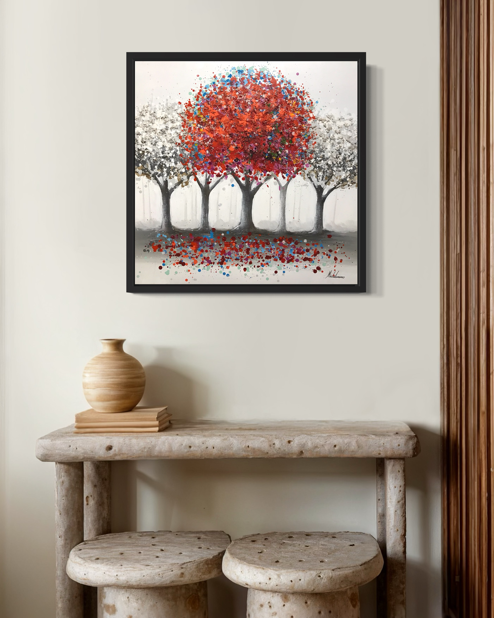 A painting with a red tree