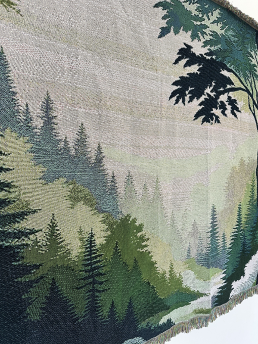 A wall rug with a verdant forest