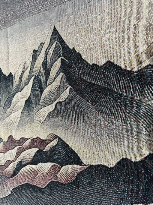 A wall rug with a mountain range