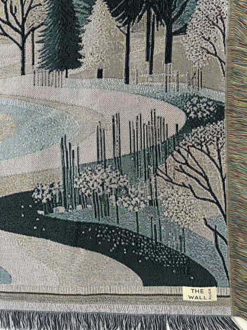 A wall rug with a winter landscape