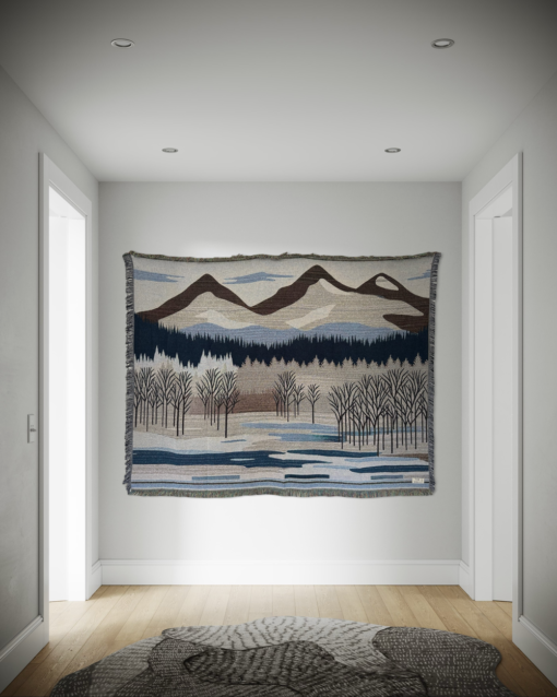 A wall rug with a mountain landscape